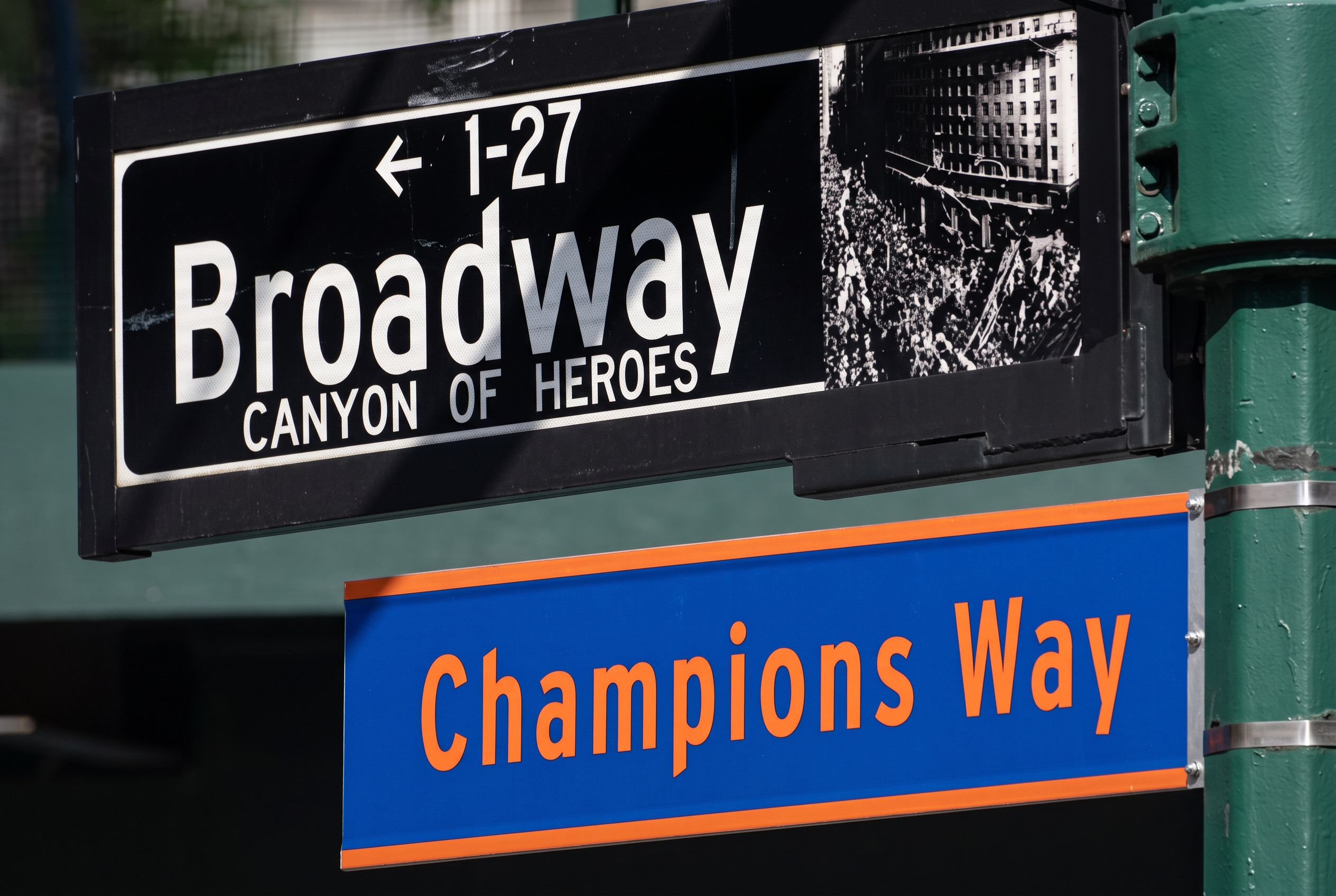 Broadway Canyon of Heroes and Champions Way street signs in Manhattan